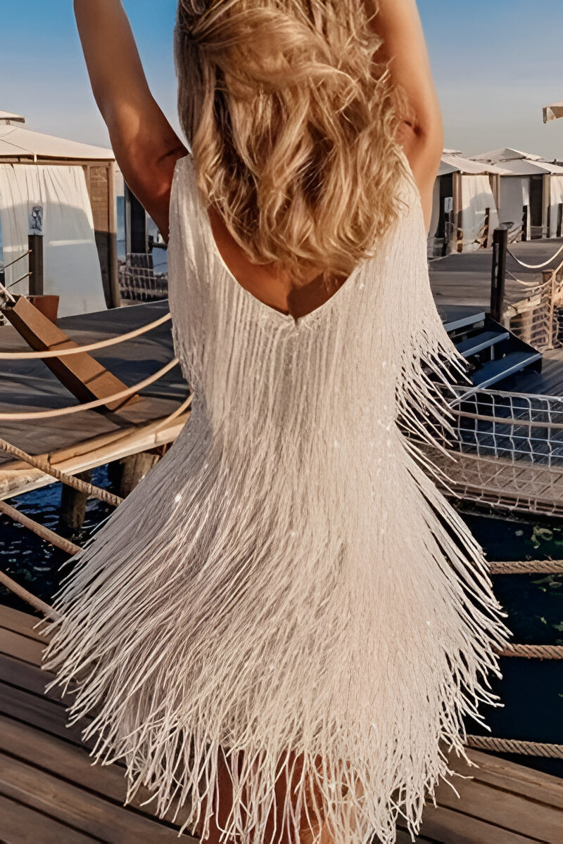 Neli | Chique Sprankelende Kwastjesjurk